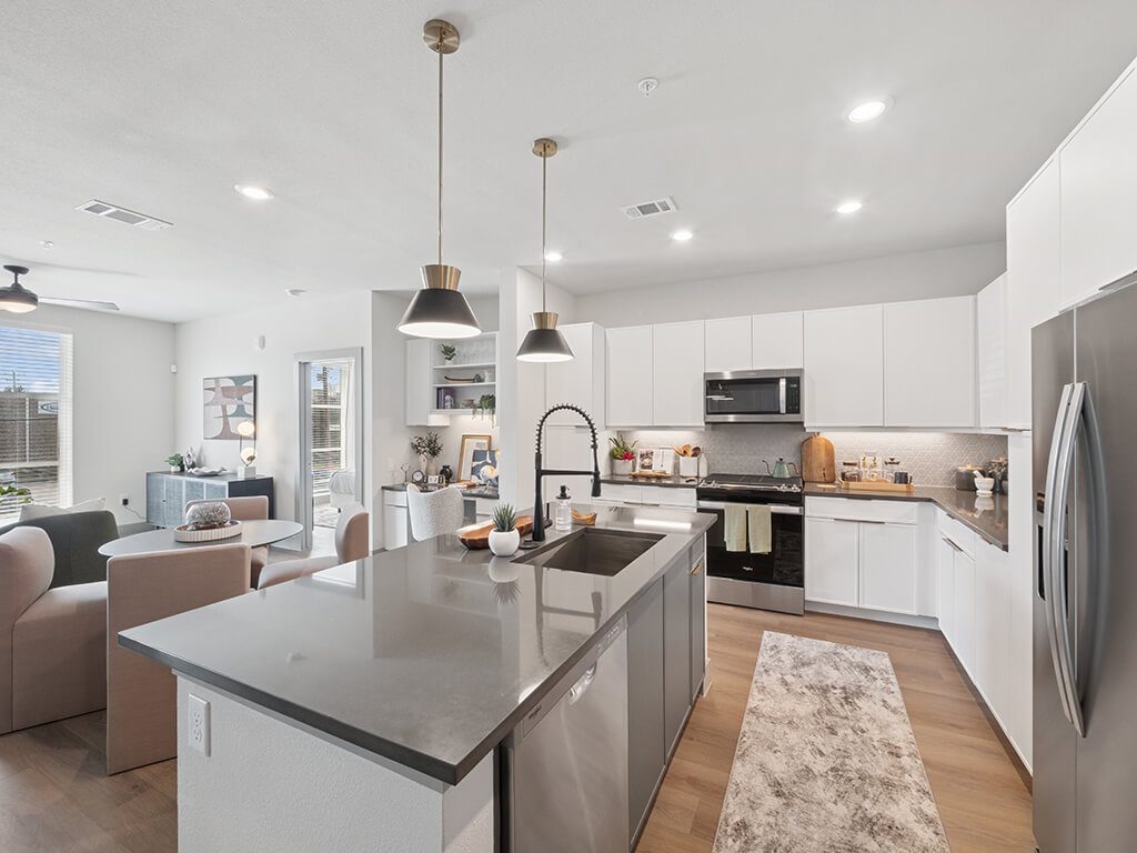 Living room and kitchen at Heights at 1520 Apartments in Houston TX